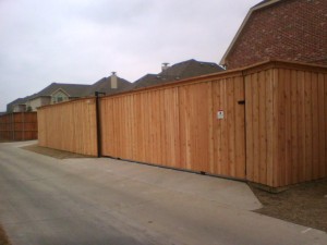 wooden driveway gate and fence
